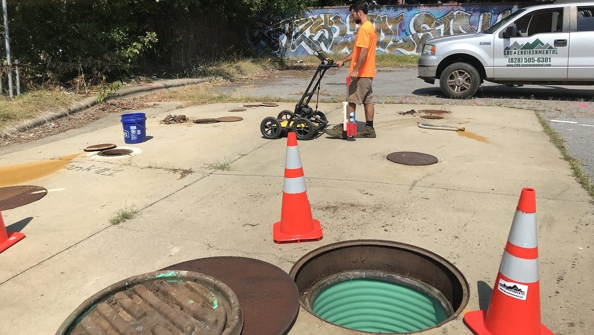 Technician using GPR to mark UST location.