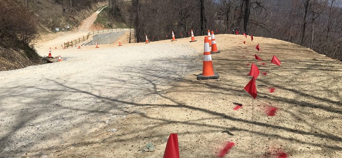 Red paint and flags marked private electrical mains.