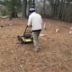 Technician pushing GPR-cart over suspected slave cemetery
